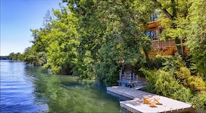 Drone view of the Chalet du Carla by the water - Private pontoon perfect for relaxing by the river