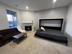 Living room: Queen size Murphy bed