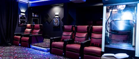 Private Custom Deadpool Movie Theater with reclining chairs and popcorn machine