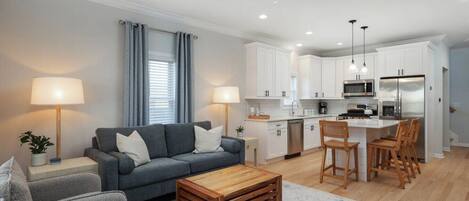 Beautiful open kitchen and living room area with the comforts of home!