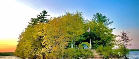 Sunrise at Loon Point:  A remote island glamor tent.  Just bring your clothes, food, and a taste of adventure.  We've got everything else!