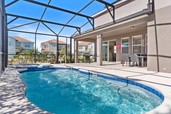 Stunning private pool of the home in Davenport Florida - Relax by the shimmering poolside oasis - Bask in sun-kissed luxury near the water - Dive into a refreshing poolside escape - Enjoy leisurely moments in inviting pool area