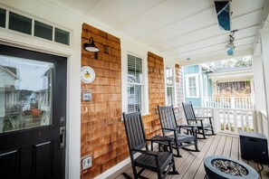 Front porch with heaters and firepit