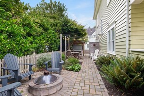 Firepit, garden patio, and covered hot tub