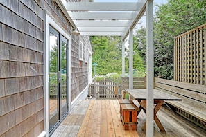 Picnic table and grill on the side deck	