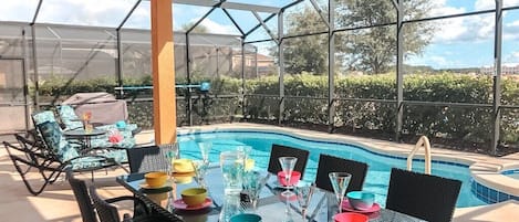 Enjoy al fresco dining under the lanai for 8 and a BBQ for your use!