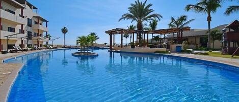 A large resort-style swimming pool where you'll love to spend time between trips to the beach