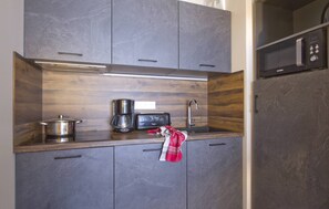 Prepare a quick dish in your kitchenette.