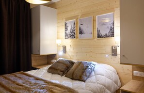 Relax on the comfy bed after a day outside.