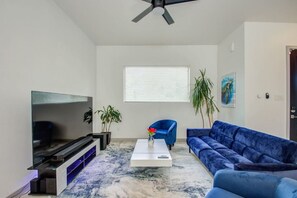 Living Room with 78" TV and Surround Sound