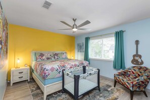 Master Bedroom - King Bed + Chair with all Baby Essentials