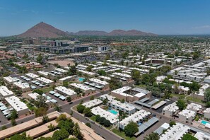 Aerial photo with views of Camelback and Phoenix Mountains.