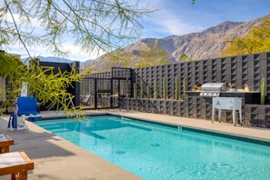 Luxe shared pool and lounge area right next to the mountains.