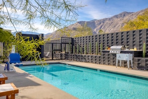 Luxe shared pool and lounge area right next to the mountains.