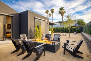 The B Suite features an outdoor space with a large firepit.