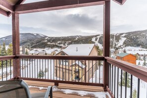 Master balcony with outdoor seating and incredible panoramic views.