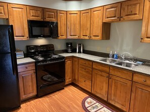 Full kitchen in Apartment A for easy meals between games