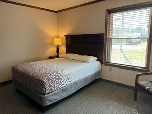 Spacious single Queen room with desk and ensuite bath