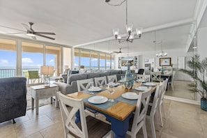 Floor to ceiling mirrors in the living room reflect and amplify - Floor to ceiling mirrors in the living room reflect and amplify the natural light from the floor to ceiling windows!