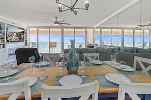 Spacious open floor plan with floor to ceiling Gulf front window