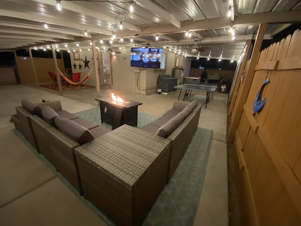 Your private patio to watch tv by the fire,  sit in the spa, or play ping pong 