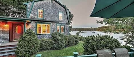 Side view of the house from the rooftop deck.  Greenwich Cove in the background 