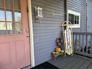 Step out of the sun/the rain/the snow on a welcoming front porch.