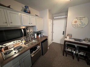 Kitchenette with microwave, dishwasher and coffee maker