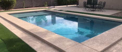 Private backyard, bbq, cornhole, seating and pool(not heated)