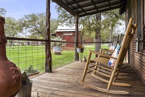 The front porch is the perfect spot to enjoy coffee and watch the chickens!