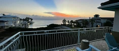 Wow Sunset Sky Villa  featuring an amazing roof top bay front home with a Roof top  sunset deck