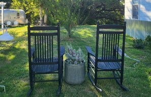 Sitting area just outside with grand oaks and Creek front Views