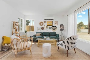 Comfy living room with mini split HVAC and great natural light. Great for escaping the desert heat after a fun day of hiking!