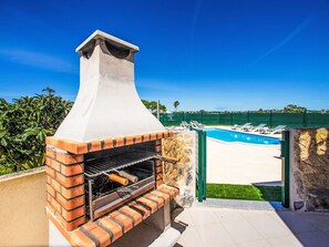 Sky, Plant, House, Building, Water, Real Estate, Roof, Landscape, Gas, Shade