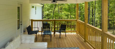 Cool breezes and the sounds of nature are always on tap on this deck attached to the master bedroom.