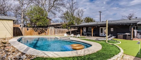 Spacious backyard with Pool, Hot Tub, Dining table, BBQ, Ping pong, Cornhole.