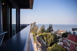 Balcony with partial sea view