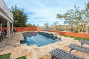 Amazing backyard space has views of the desert open space (wash) and trails.