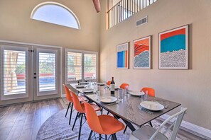 The dining room has plenty of space for everyone. Set for 8, add 2 more for 10.