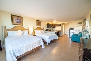 Two queen sized beds with high thread count linens