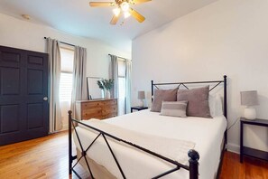 Bedroom 2: Welcome to our master bedroom, where you'll find a cozy queen-sized bed with soft bedding and a soft comforter for a good night's sleep.