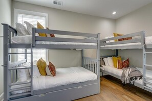 Bunk room with 2 twin over twin bunks w/ pull out trundle bed