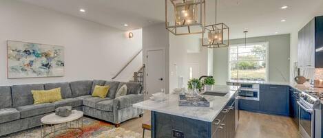 View of living area and kitchen. Open floor plan!