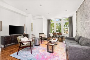 Ample seating with 65" TV.  Unit 7. 
