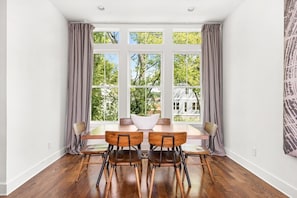 Unit 7 - natural light galore in the dining room.  