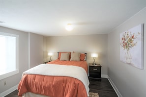 Enjoy this queen size bed with matchings nightstands on both side