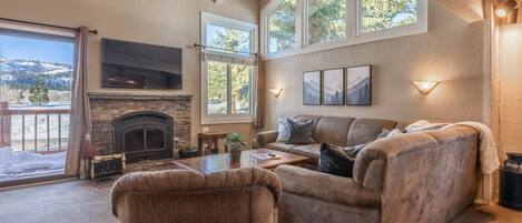 Living room with amazing mountain views and natural light.