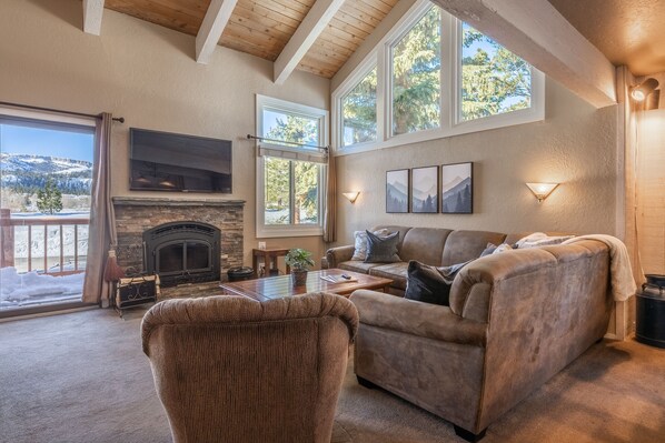 Living room with amazing mountain views and natural light.