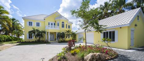 Driveway view of the main villa and guest house. This listing books both for larger groups. 