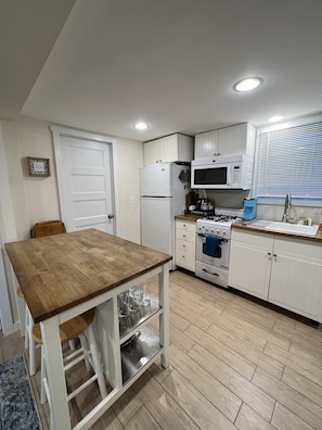 Full kitchen - pots, pans, dishes, cooking utensils